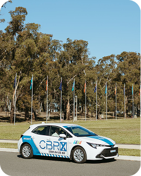 CBRX security company vehicle parked on the road